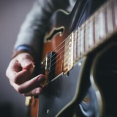 person playing guitar