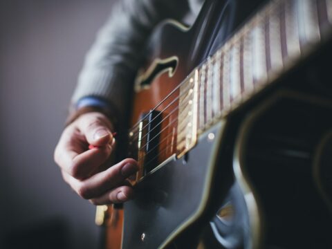 person playing guitar