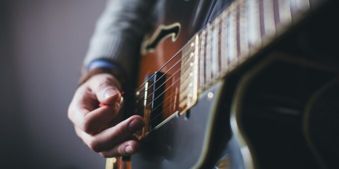 person playing guitar