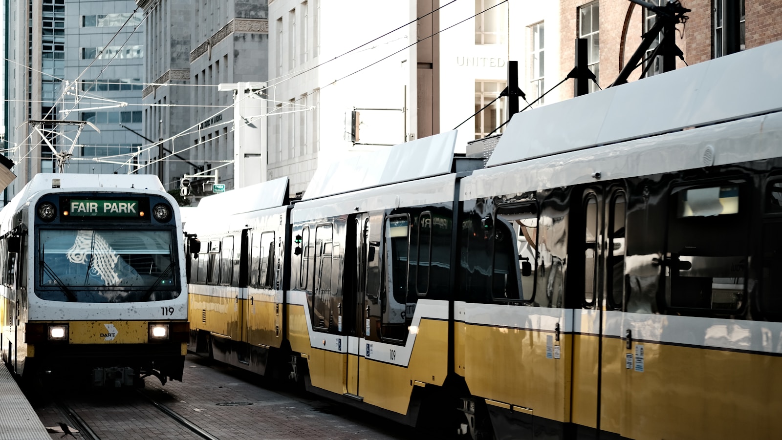 a couple of trains that are next to each other