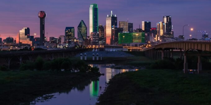 city skyline during night time